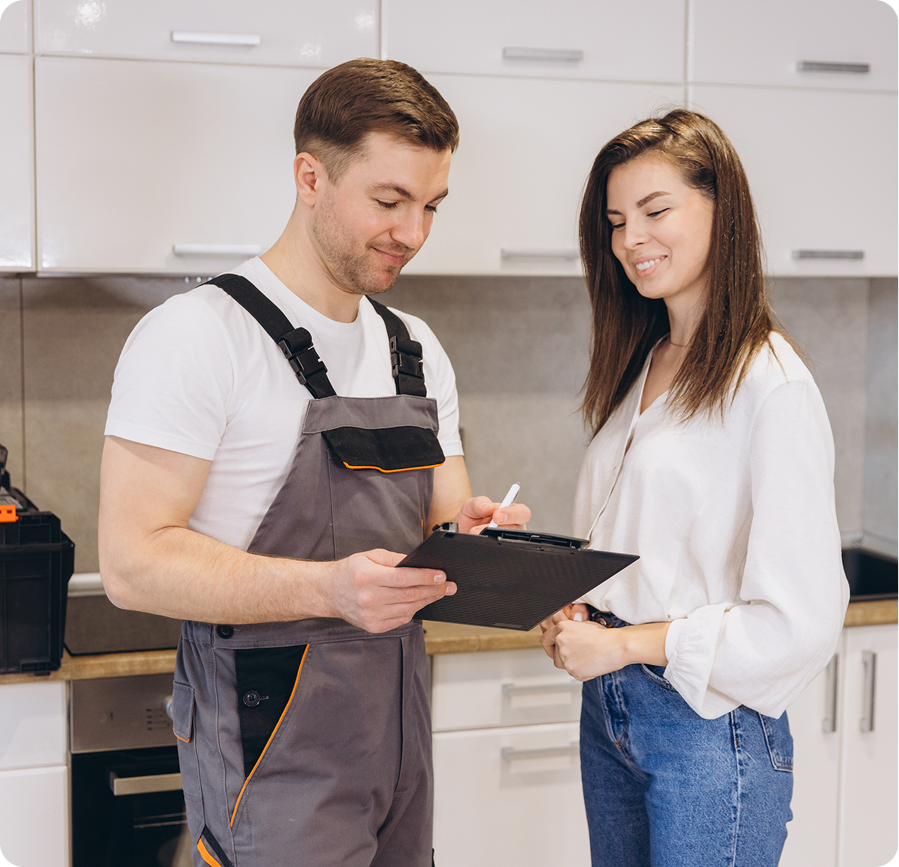 Couple reviewing home maintenance checklist